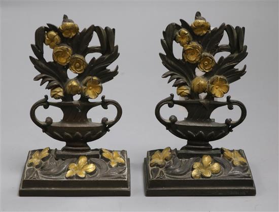 A pair of bronze shelf ornaments